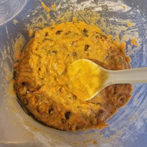 Mixing carrot cake ingredients